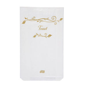 White Tork paper bag printed Toast in gold script with a gold leaf motif above the wording