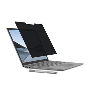 Kensington MagPro Elite Privacy Screen for Surface Laptop 13.5 Inch partly lifted from the screen of a Surface Laptop, with a Surface Pen lying in front