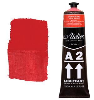 Chroma A2 Heavy Body Acrylic Cadmium Red Medium Hue 120ml tube with Cadmium Red Medium Hue shoulder label, beside a painted swatch of a saturated mid red that stays strong when thin