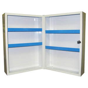 White metal first aid cabinet standing open, showing the shelves with blue edge strips and the lock on the door