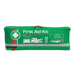Long green roadside soft pack with reflective strips, a carry handle and a white cross roundel, printed First Aid, Warning Triangle and High-Vis Vest with a tow truck icon and the Voyager mark