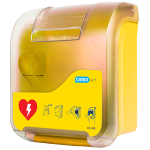 Yellow wall mounted AED cabinet with a clear hinged cover, printed with a red heart symbol and rescue pictograms, marked CC-90 with the CARDIACT mark