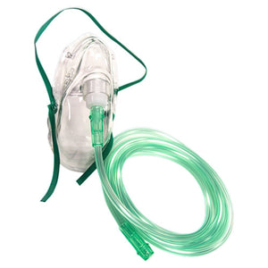 Clear oxygen therapy mask with an elastic head strap and a long length of green oxygen tubing attached