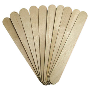 A fan of wooden tongue depressors laid out on a plain background