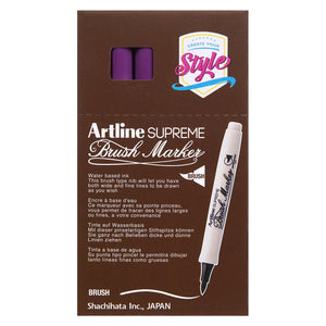 Front of an Artline Supreme Brush Marker box with magenta markers showing through the window