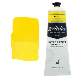 Chroma Atelier Interactive Acrylic Paint 80ml Arylamide Yellow Light: tube with a primrose yellow colour band beside a painted swatch of a bright, cool primrose yellow