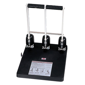 Colby KW-953 three hole power punch with twin lever arms and black grip handles above three punch heads on a black base with an instruction label