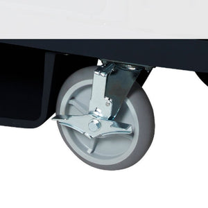 Close view under a trolley base of the Compass 722472DW grey drive wheel on a metal bracket with a brake lever