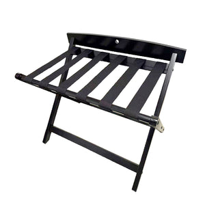 Compass black wooden luggage rack open, six black nylon straps across the top and a curved back board with a cut-out handle
