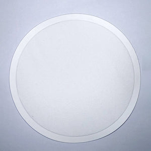 Plain white round Connoisseur paper coaster on a pale blue background, with an embossed ring just inside the outer edge