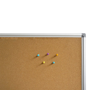 Close up of the Rapidline Standard Corkboard surface holding five coloured map pins, with the aluminium frame along the top and right edges.