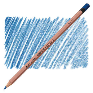 Derwent Metallic Blue 12 pencil laid diagonally across a hand-shaded swatch of the colour, showing the barrel printed DERWENT METALLIC and the sharpened point