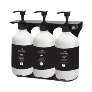Dolphy EcoFlow refill dispenser set, three white pump bottles with black labels held side by side in a black wall bracket