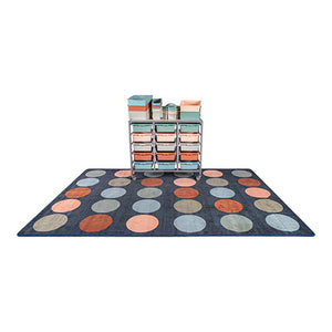 Elizabeth Richards Colours of Australia Circle Rug showing 30 earthy-toned circle segments arranged on a classroom floor
