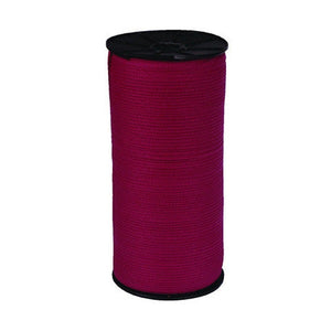 Tall spool of deep pink Esselte legal tape wound on a black plastic reel