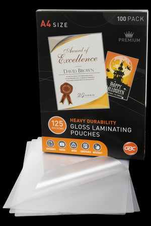 Dark GBC A4 size 100 pack box of 125 micron heavy durability gloss laminating pouches standing behind loose clear pouches