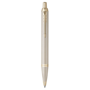 Parker IM Monochrome ballpoint pen in champagne gold with matching champagne clip and trims, standing upright