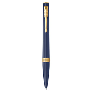 Parker Meridian ballpoint pen in blue lacquer with gold trims standing upright, showing the arrow clip, centre band and medium tip