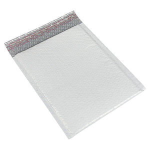 Polycell Maxi Tuff bubble mailer in light grey lying at an angle, with a textured padded face and a printed peel strip running across the flap end