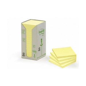 Grey Post-it tower carton holding a stack of canary yellow 76 x 76mm pads, with four loose yellow pads fanned beside it