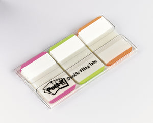 Clear Post-it dispenser of 686L-PGO lined tabs, white tabs edged in pink, green and orange, with Durable Filing Tabs printed on the base