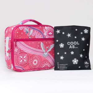 Spencil Galah Story Big Cooler Lunch Bag photographed beside the Big Chill Pack in its black snowflake cover, showing the pink-toned artwork featuring galahs, finished with hot pink trim and handle