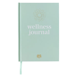 Spirax Platinum wellness journal in a mint A5 hardcover with a gold sunburst above the words wellness journal and a mint ribbon