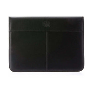 Front of the closed black Spirax slimline compendium with an embossed Spirax logo near the top and a stitched centre seam