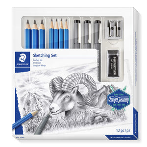 Staedtler Design Journey Sketching Set box with a window showing blue pencils, grey pigment liners, sharpener and black eraser above a pencil drawing of a ram, 12 pc
