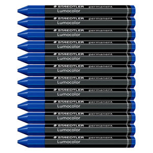 Twelve blue Staedtler Lumocolor permanent omnigraph crayons stacked side by side, each with a blue tip and dark wrap printed Lumocolor