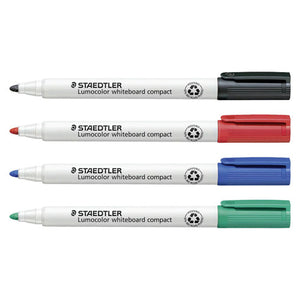 Four capped Staedtler Lumocolor whiteboard compact markers in black, red, blue and green lying in a row, white barrels with grey print