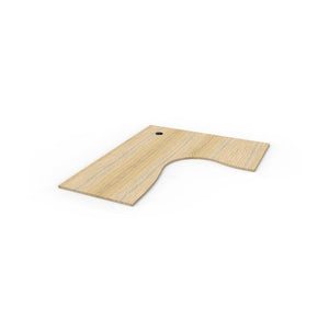 Rapidline corner workstation top in Natural Oak, shown on its own at an angle against a plain white background