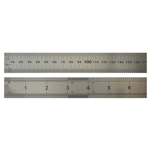 Close-up of the X-Press It 100cm steel ruler markings: millimetre graduations numbered to 170 above an inch scale numbered 1 to 6