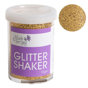 Made For You Glitter Shaker tub with gold glitter showing through the clear sides, a purple label reading 15gm, a white lid and a round close up of the gold grains