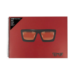 Geek Visual Diary A3 with a red cover printed with black framed glasses, double wire binding on the left edge and a black corner label listing 110gsm cartridge paper