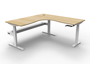 Rapidline Boost Crank manual height adjustable corner workstation, E0 rated Natural Oak top on a white satin powdercoated frame. Supplied product image for model BCCNRCT1P1818 NO/WS. View 1.