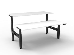 Rapidline Boost Plus electric height adjustable back to back workstation, E0 rated Natural White top on a black satin powdercoated frame. Rapidline range image supplied for model B+2P1875 NW/BL.