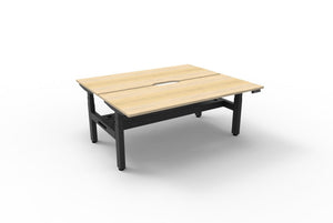 Rapidline Boost Plus electric height adjustable back to back workstation, E0 rated Natural Oak top on a black satin powdercoated frame. Rapidline range image supplied for model B+2PCT1575 NO/BL.