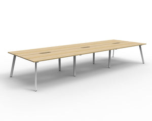 Rapidline Eternity back to back 6 person workstation in Natural Oak with a White Satin base, no screen, angled studio view on a white background