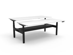 Rapidline Halo Plus electric height adjustable back to back workstation on 70mm diameter round columns, E0 rated Natural White top with a black satin powdercoated frame, fitted ducted cable tray. Rapidline range image supplied for model H+2PCT1575 NW/BL.