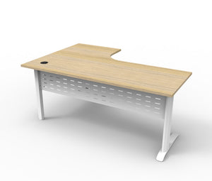 Rapidline Deluxe Rapid Span corner workstation with a Natural Oak top on White Satin span legs and a perforated metal modesty panel, angled front view along the long wing.