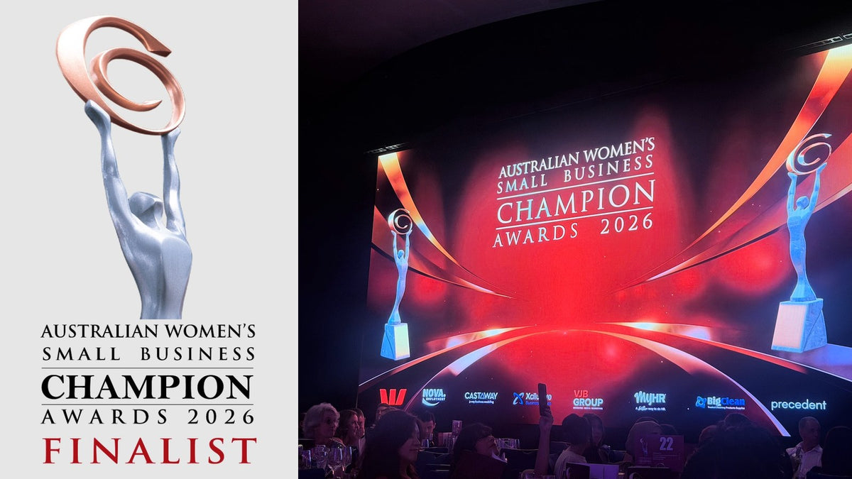 Mega Office Supplies – 2026 Australian Women's Small Business Champion Awards finalist badge beside the gala stage in Sydney