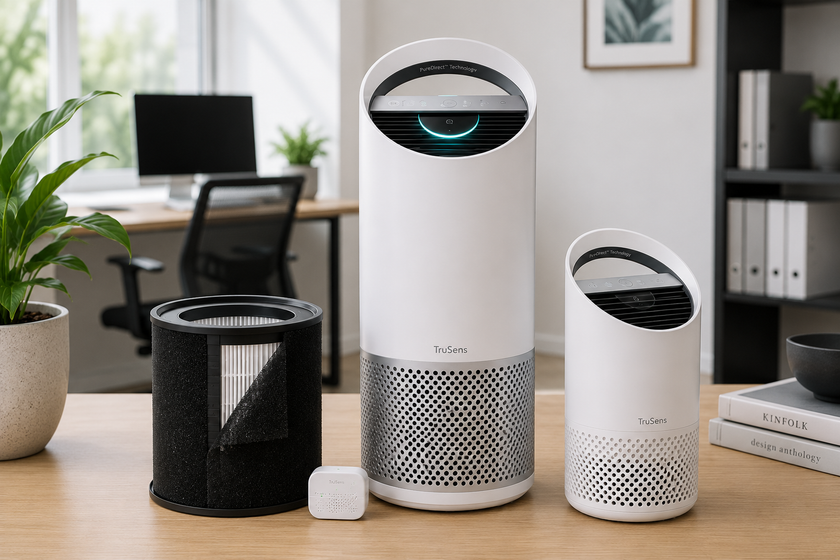 Trusens air purifier products arranged on a clean modern office desk with replacement filter, sensor and workspace background.