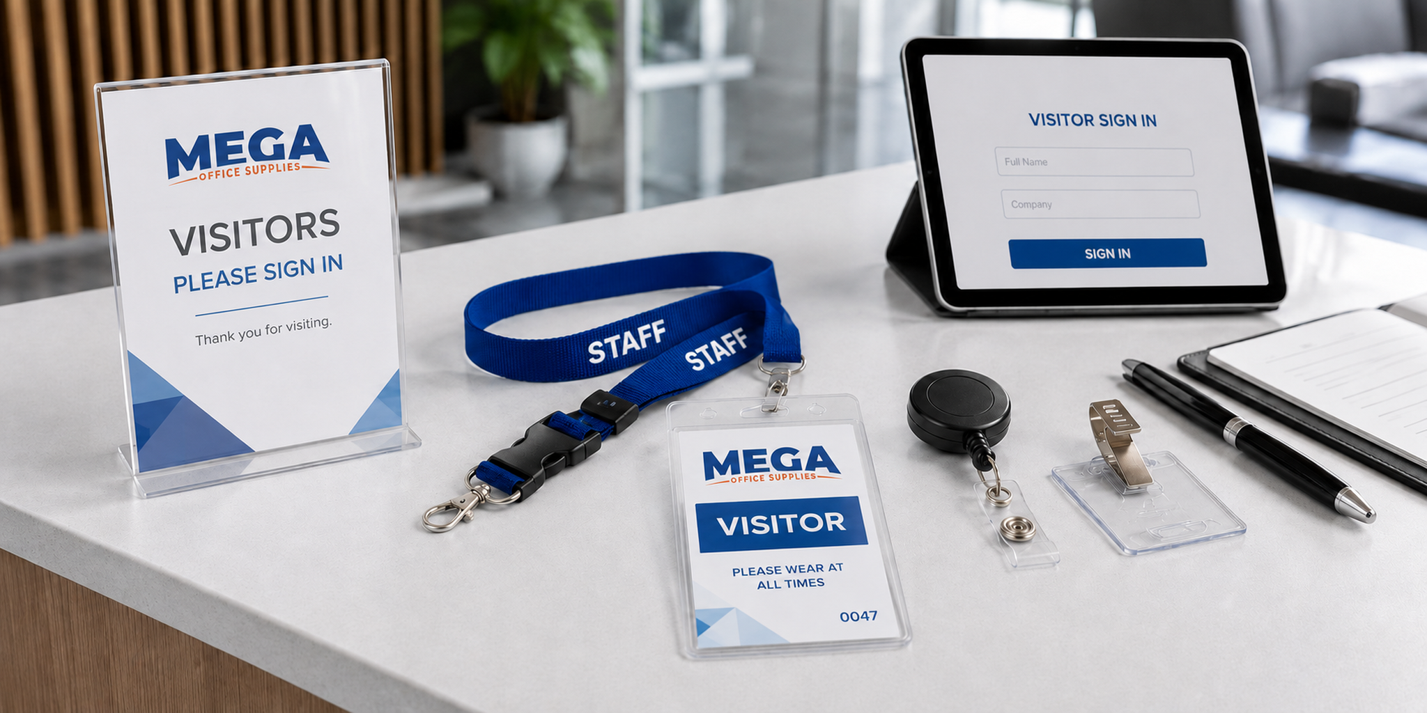Identification holders, staff lanyards and visitor badges arranged on a modern corporate reception check-in desk.