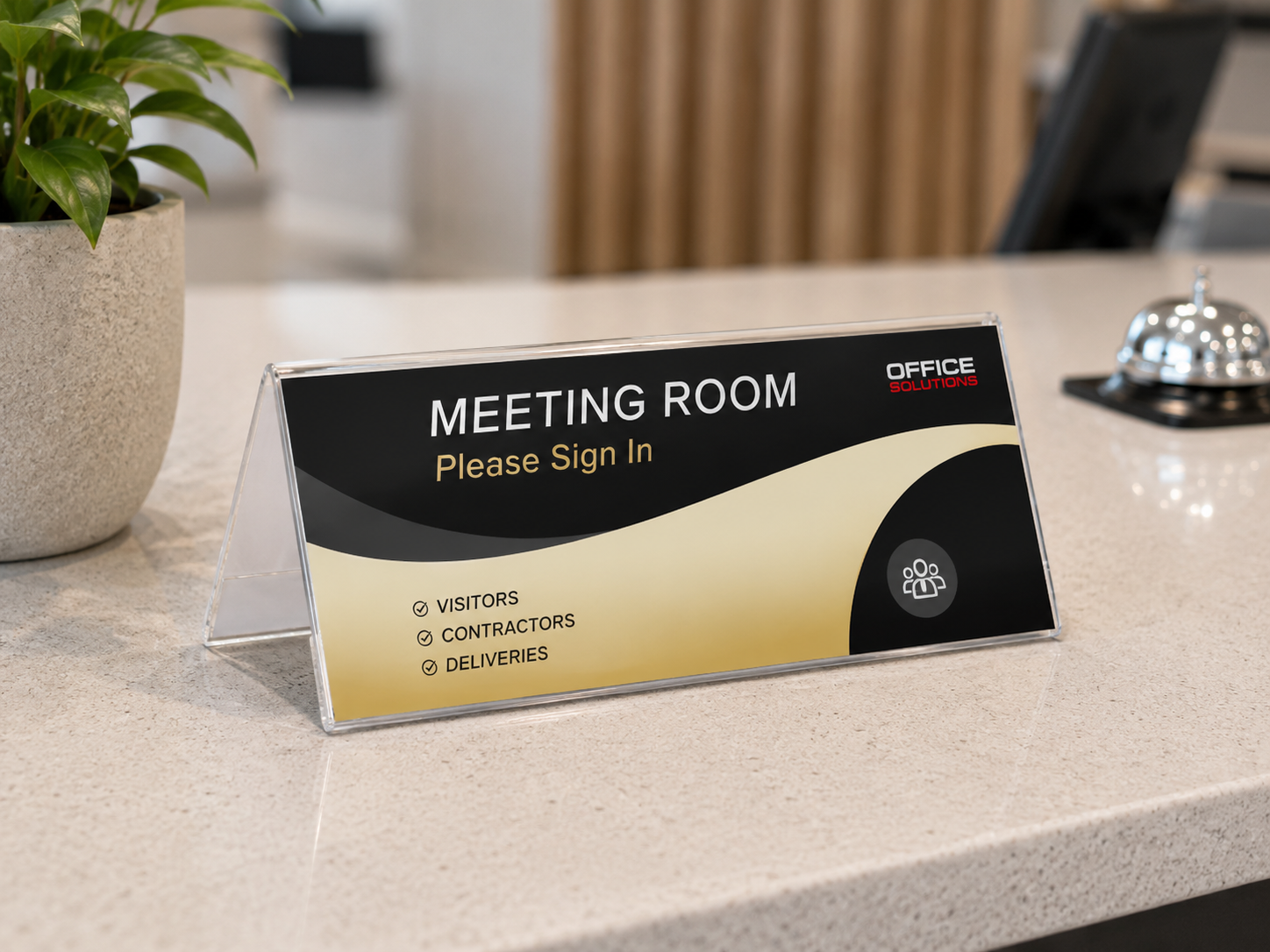 Tent sign holder displayed on a bright office reception counter with meeting room sign in a professional workspace.