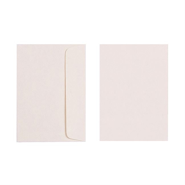 Two Quill 80gsm C6 envelopes in Cream on a white background, one turned to show the flap side and one showing the plain front