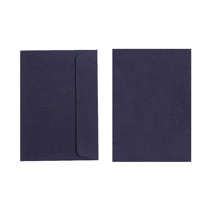 Two black Quill C6 envelopes on a white background, one turned to show the wallet flap and one showing the plain front