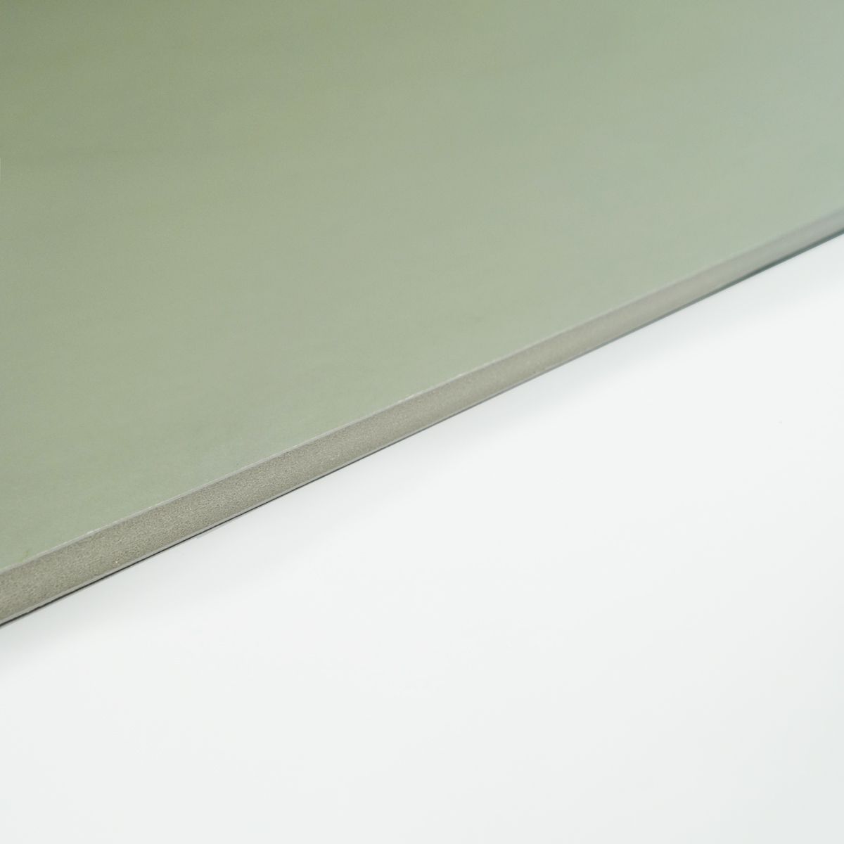 Quill Foam Board in grey seen at a low angle along one edge, showing the smooth grey face against a white background