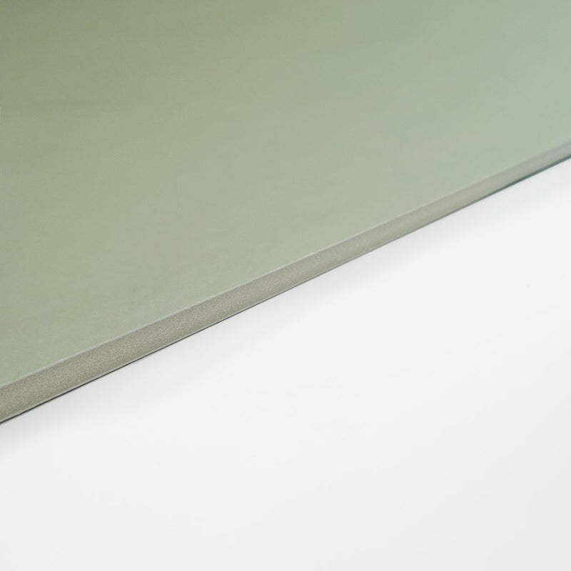 Quill Foam Board in grey seen at a low angle along one edge, showing the smooth grey face against a white background