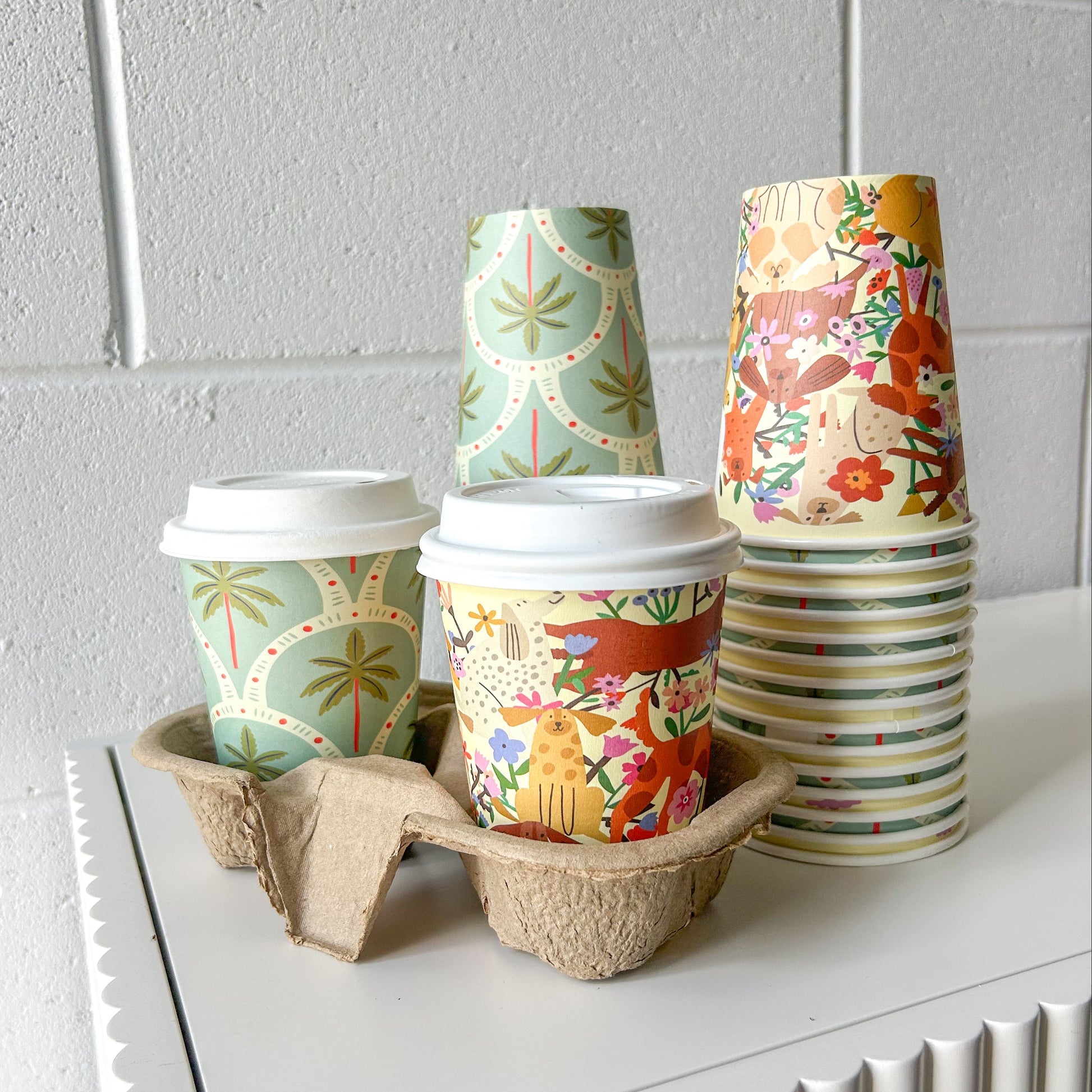 Creative Cafe Co 12oz Dogs & Palms coffee cup with cup tray